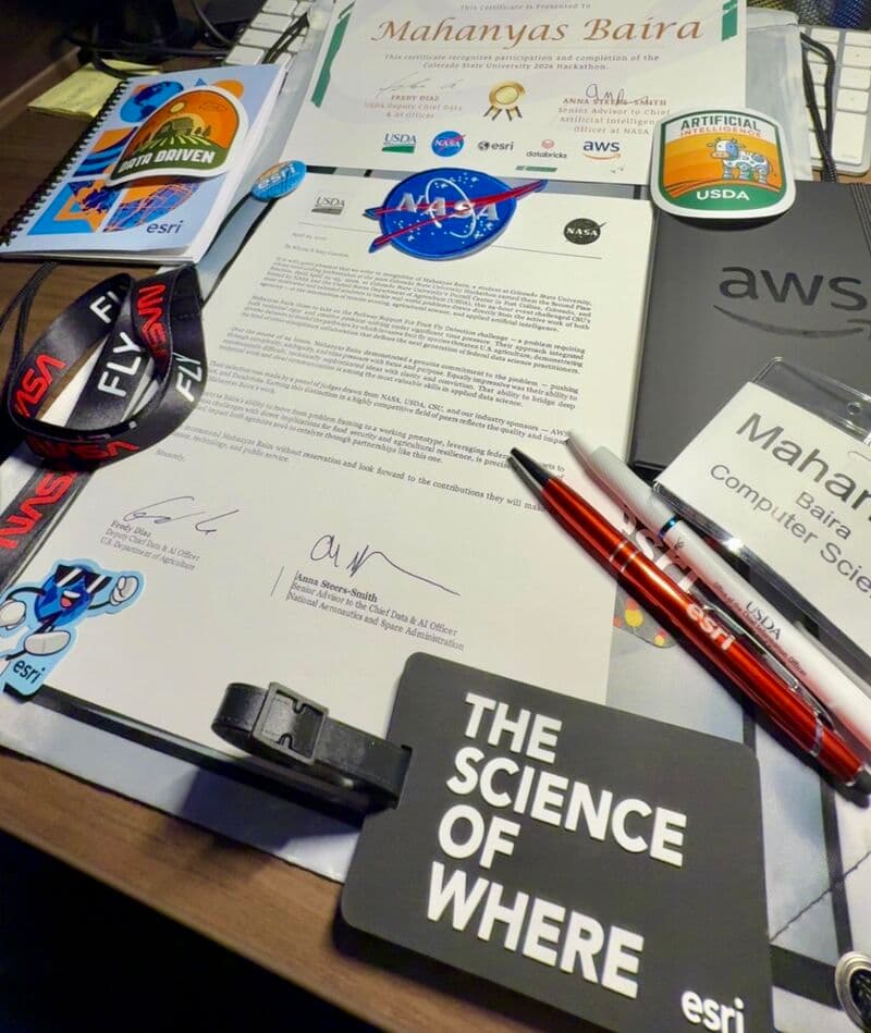 Recommendation letter, NASA and USDA badges, and hackathon swag from the NASA x USDA x AWS x Databricks x Esri hackathon.